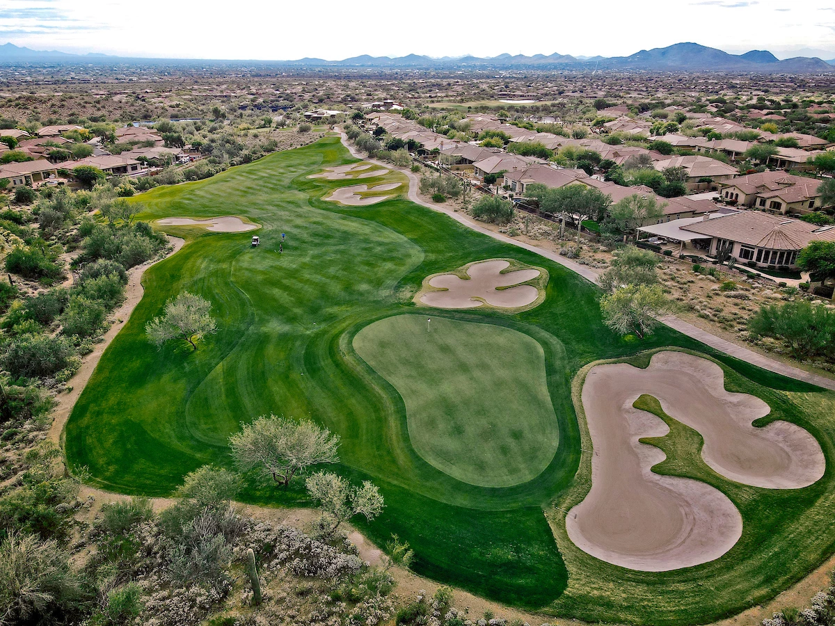 aerial view of a hole on the Ironwood course of Anthem CC with the green and bunkers in the lower right third.